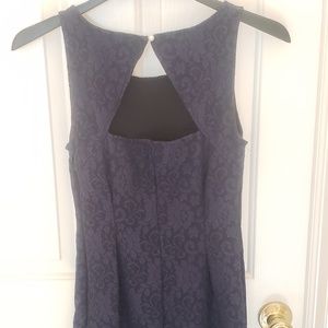Jennifer Lopez dark blue lace sheath dress